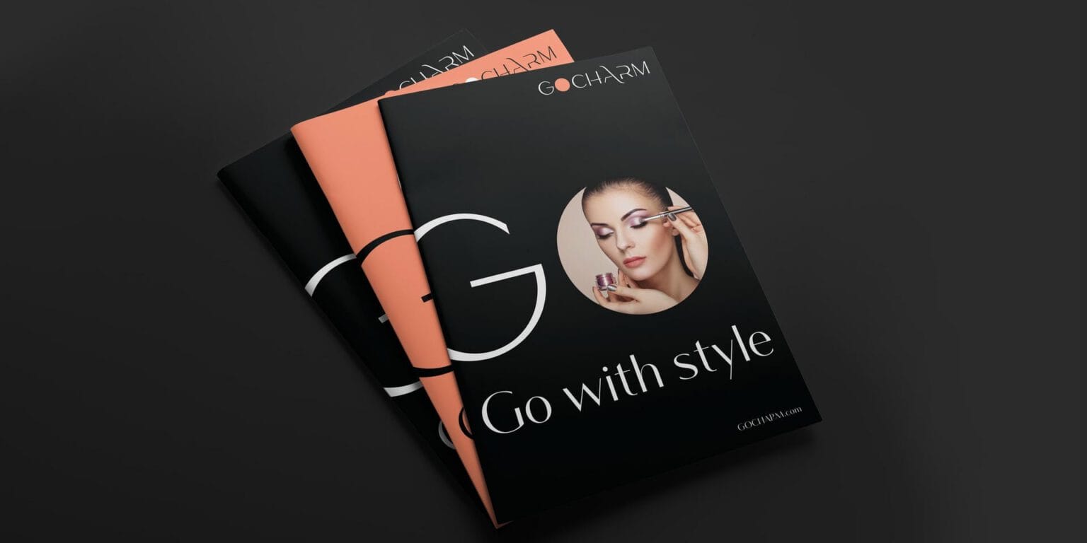 Ấn phẩm GOCHARM với chữ Go ôm gương mặt người mẫu và câu Go with style