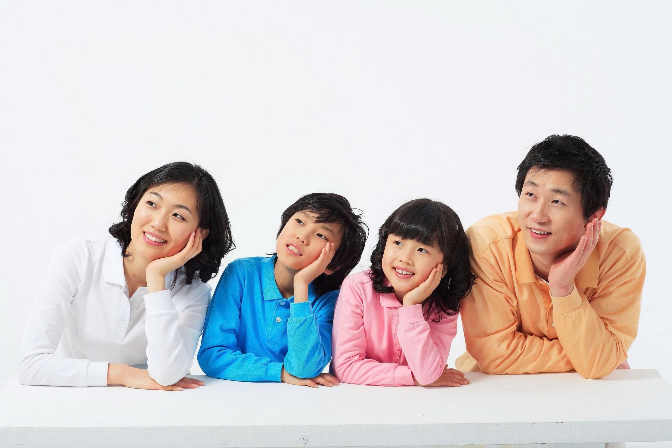 A smiling family in an Oreli campaign image